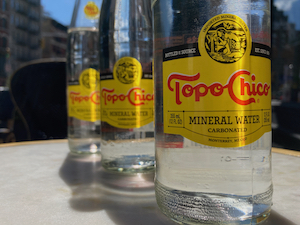 close up of three topo chico mineral waters